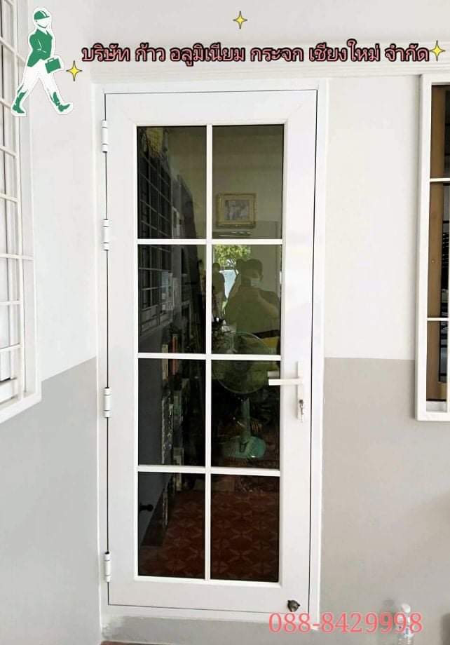 ประตูบานเปิดอลูมิเนียม  พร้อมแต่งเส้นลูกฟัก