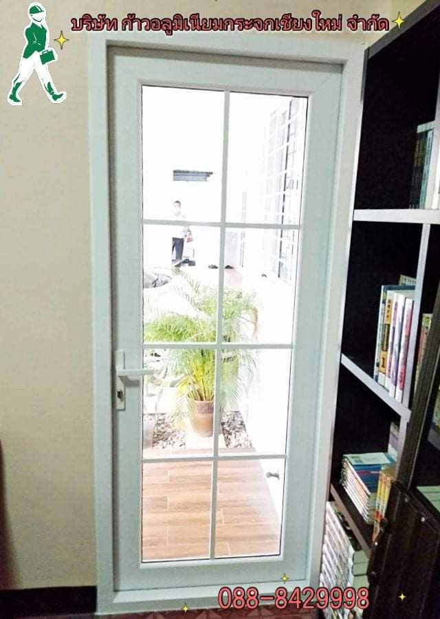 ประตูบานเปิดอลูมิเนียม  พร้อมแต่งเส้นลูกฟัก